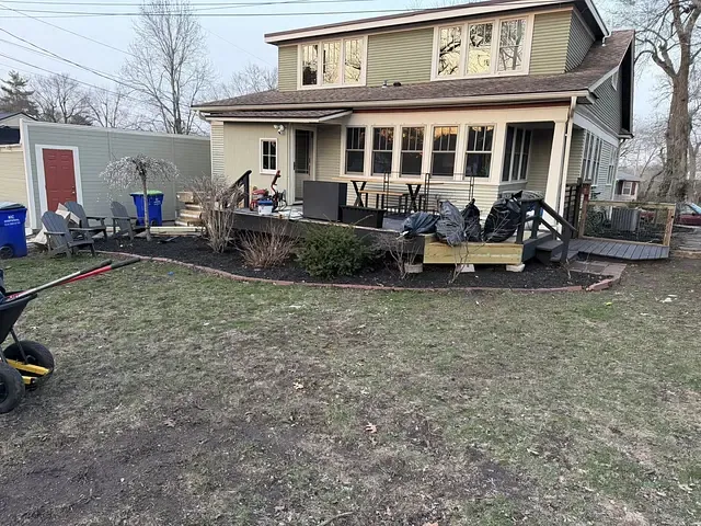 Front beds re-cut and cleared, part-way through a spring refresh.